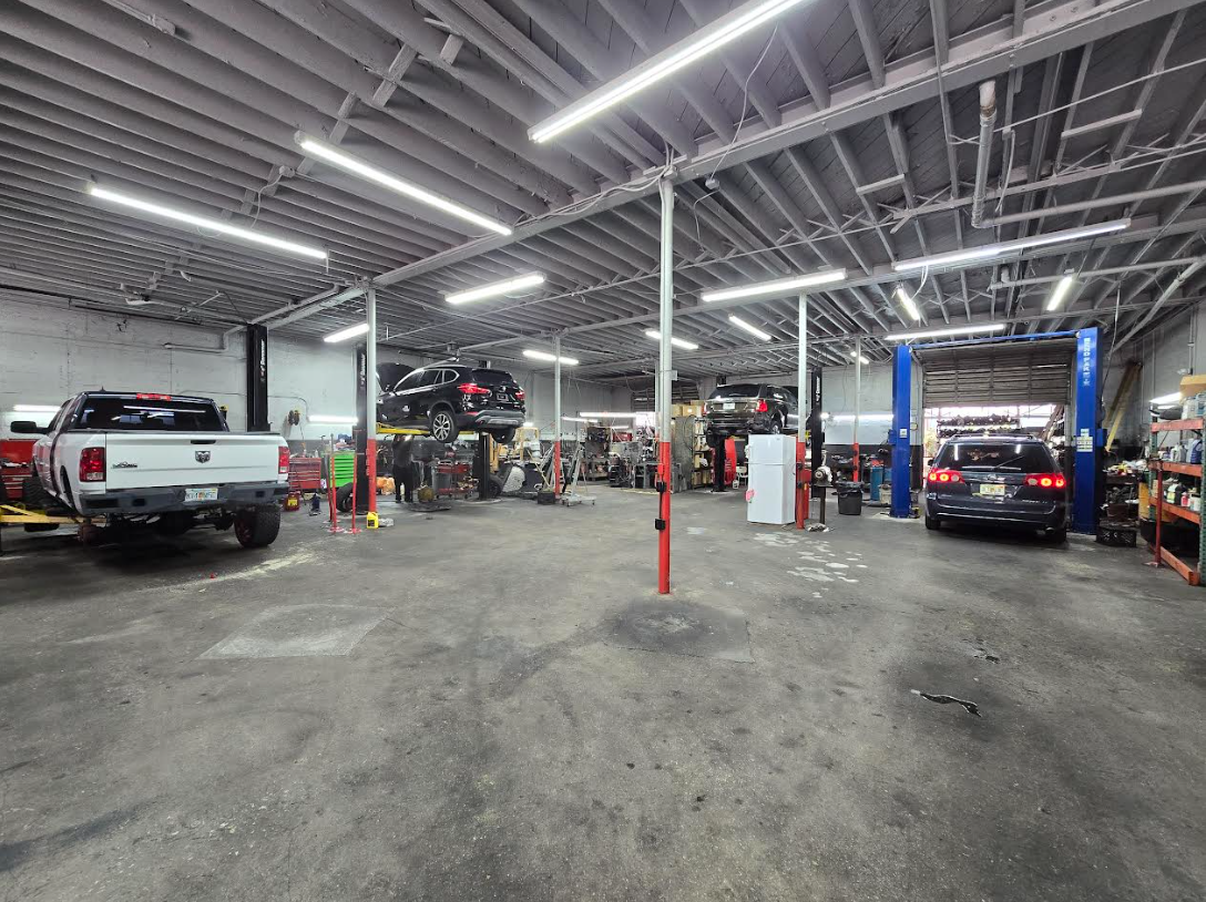 Inside the SSP service bay with vehicles on lifts